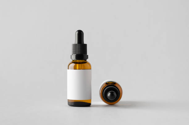 Amber dropper bottle of Growth Oil with a blank label mockup